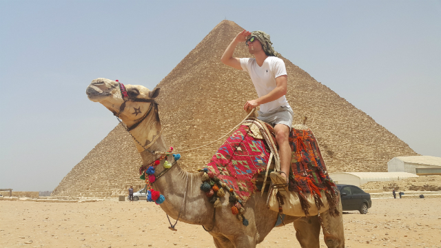 Camel Back Riding at Giza Pyramids by Mohamed Said