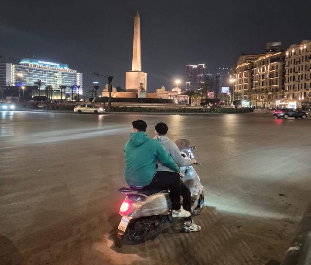 Tahrir Square at night by Passainte Assem